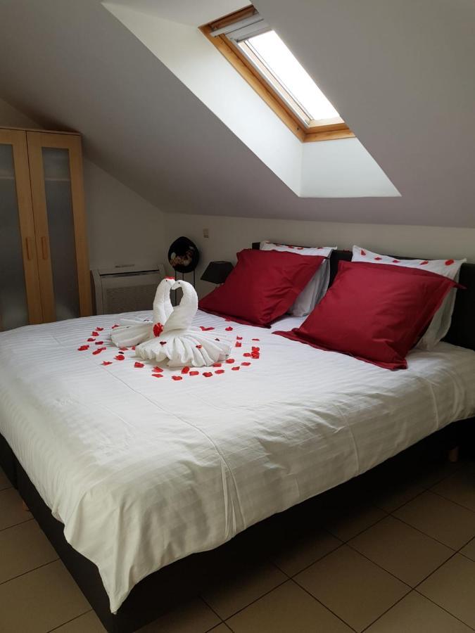 De achtertuin Appartement Maasmechelen Buitenkant foto