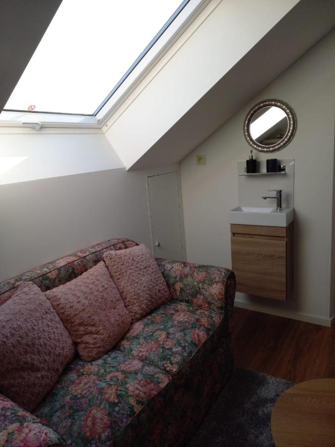 De achtertuin Appartement Maasmechelen Buitenkant foto