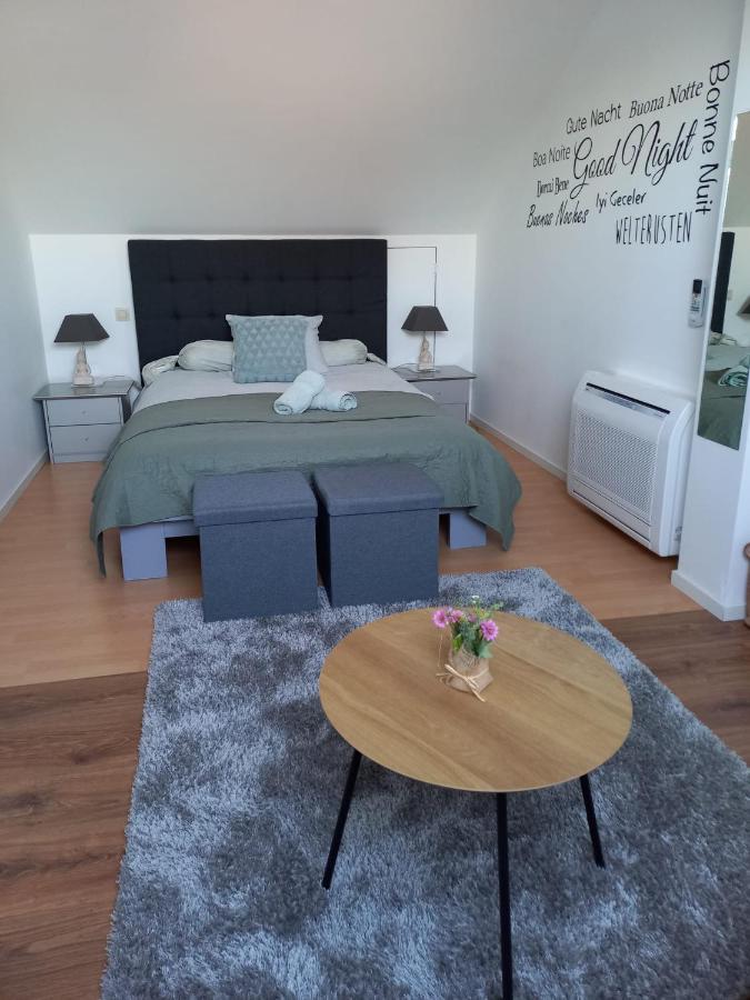 De achtertuin Appartement Maasmechelen Buitenkant foto